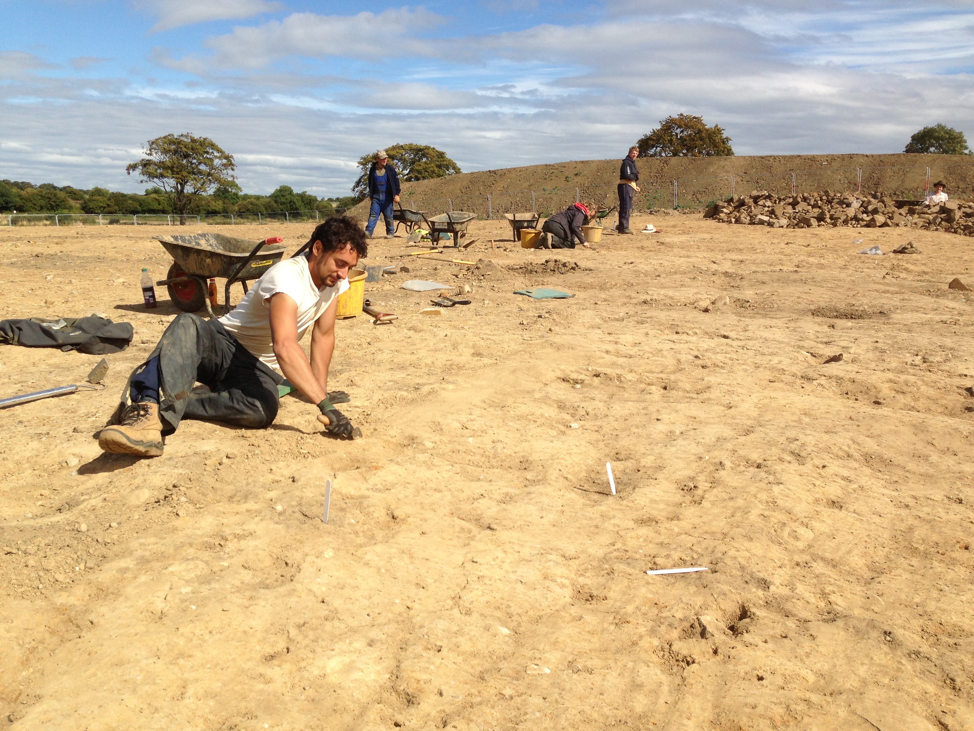 Andreas digging in an archaeology site.